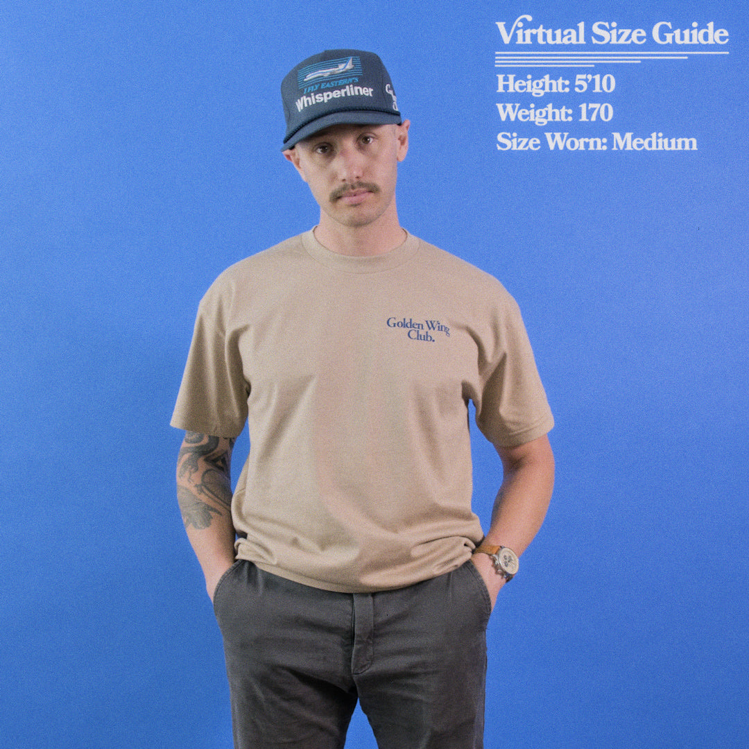 Man wearing Golden Wing Club RB211 Shirt